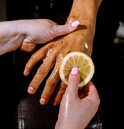Applying scrub during pedicure at Hammer & Nails